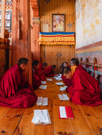 amankora-bhutan-bumthang-jakar-dzong-monks.jpg